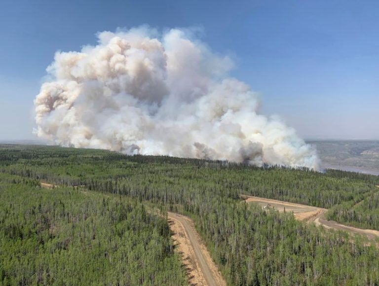 More than 29,000 people are evacuated from communities throughout Alberta as wildfires rage in Canada