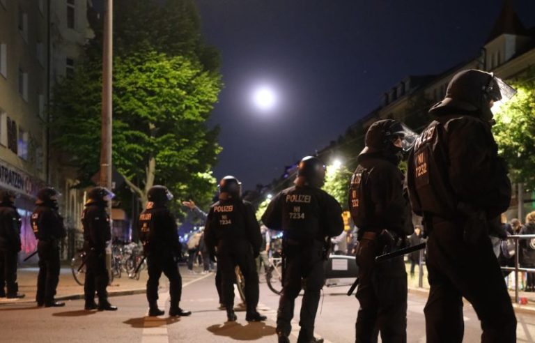 Far-left protesters clash with police in Germany over jail term for woman who attacked neo-Nazis