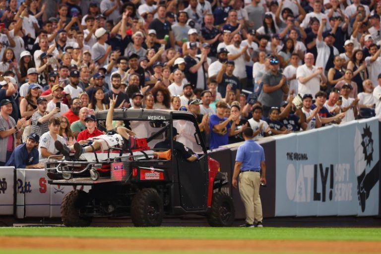 Cameraman carted off the field after getting hit by throw in Yankees game; is ‘conscious’ and ‘undergoing tests’ at hospital