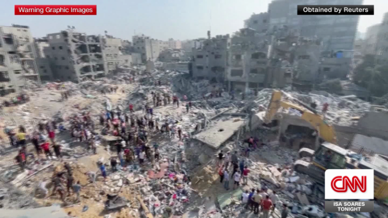 Airstrikes blast UN shelters, official says, as Israel announces complete encirclement of Gaza city