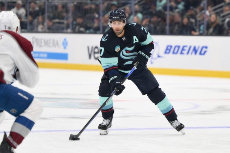 Kraken forward out after getting cut by skate in practice