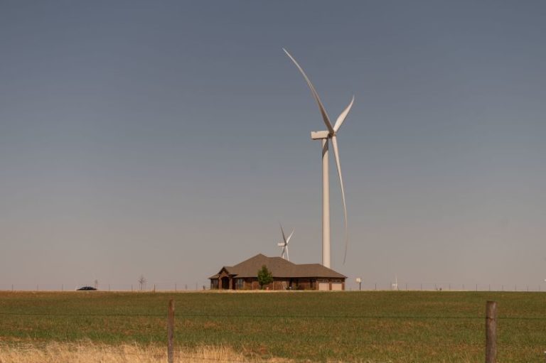 How much are wind turbines dragging down home values? A new study has surprising answers