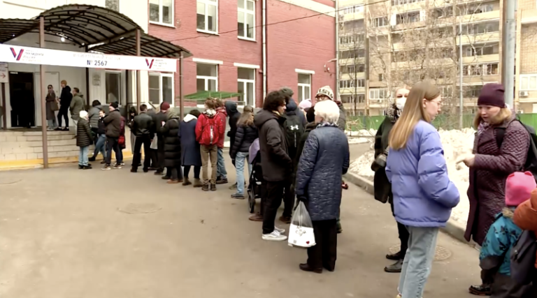 Russia sees polling station protests as Putin set to extend long rule