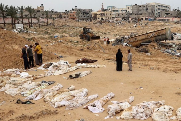 Almost 400 bodies have been found in mass grave in Gaza hospital, says Palestinian Civil Defense