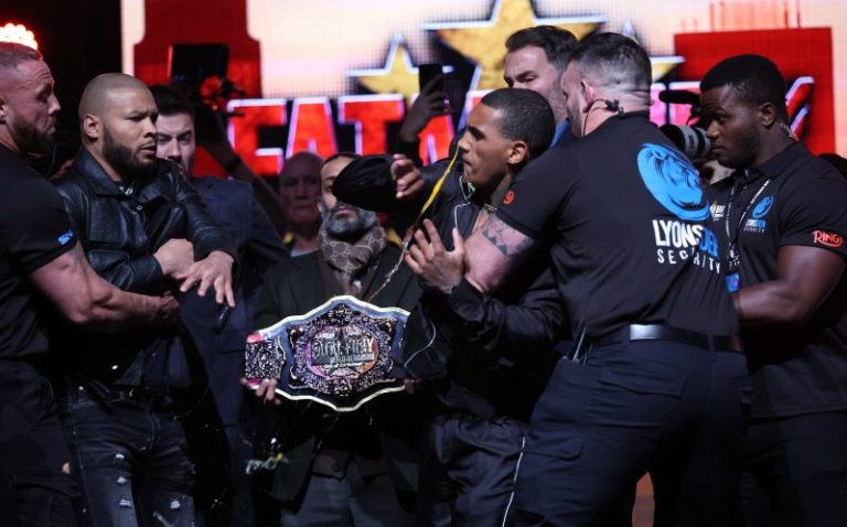 Chis Eubank Jr. slaps Conor Benn with an egg in the face at face-off