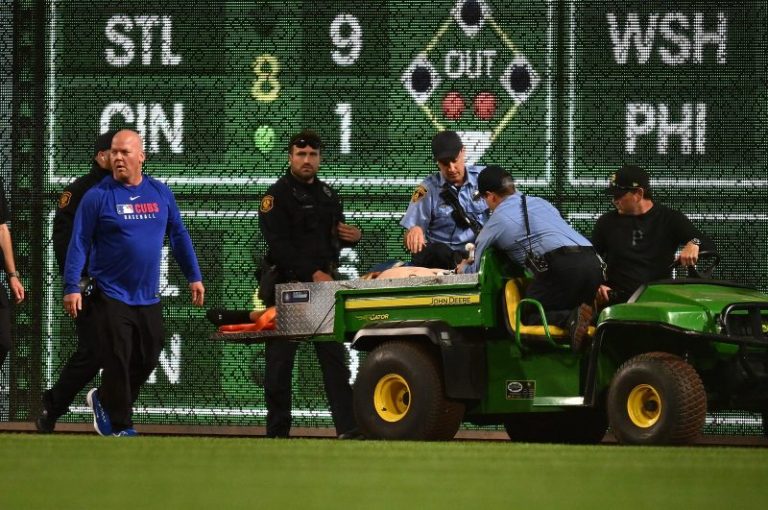 MLB fan in critical condition after falling out of stands onto field