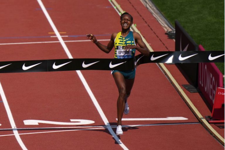 Faith Kipyegon nearly becomes first woman to break 4-minute mile