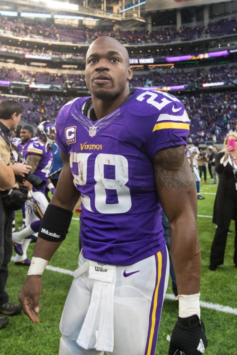 Ex-NFL star Adrian Peterson wins fight over his 2007 BMW in debt case